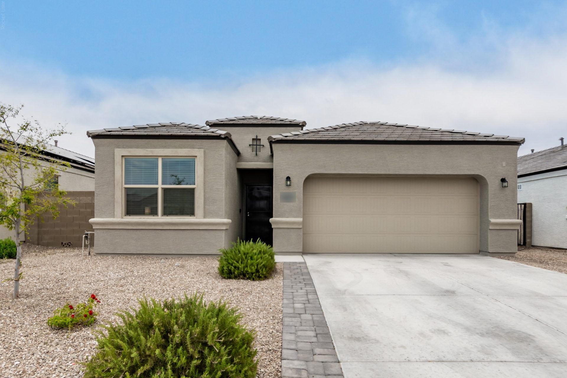 Newer single-story home with a two-car garage