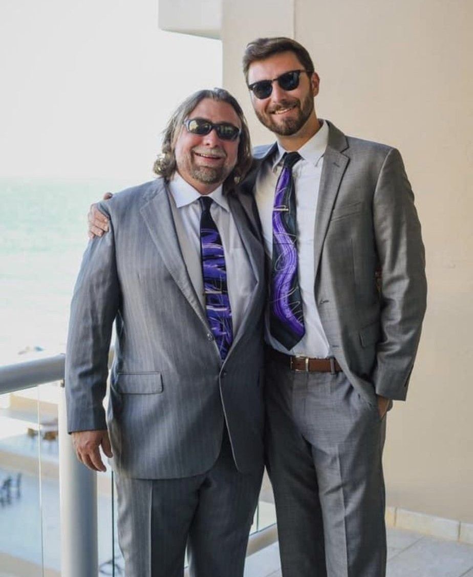 Stephen with his father, also a real estate broker